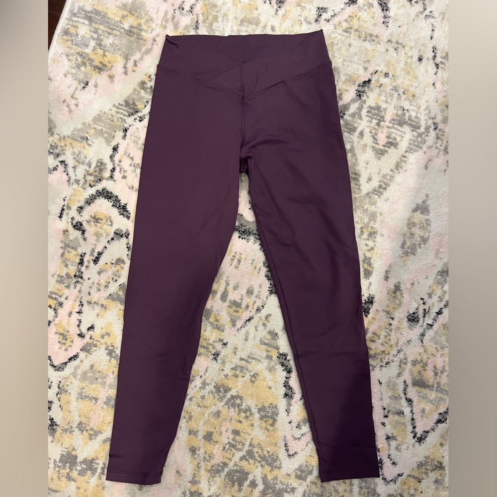 Purple athletic leggings with crossover waist, size M.